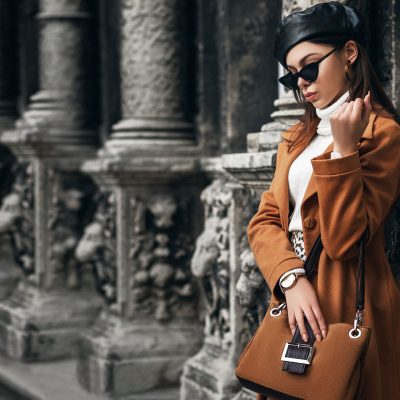 Outdoor fashion portrait of  elegant woman wearing sunglasses, l